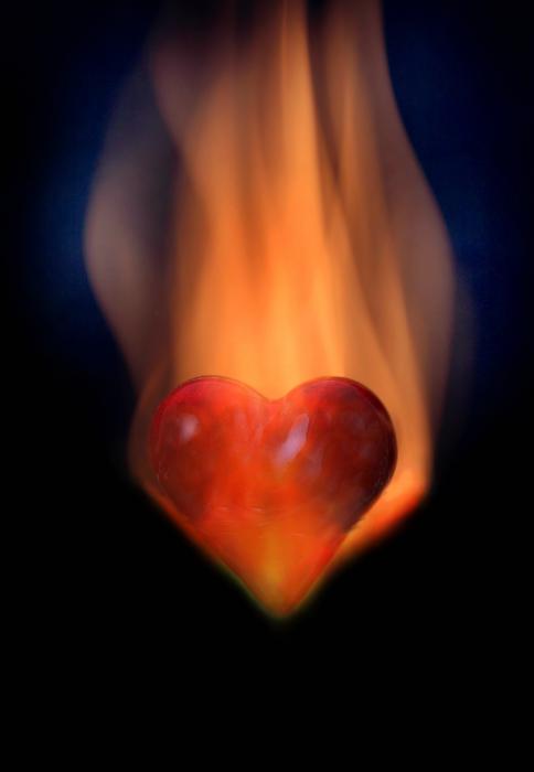 Love-heart in flames Photograph - Love-heart in flames Fine Art Print