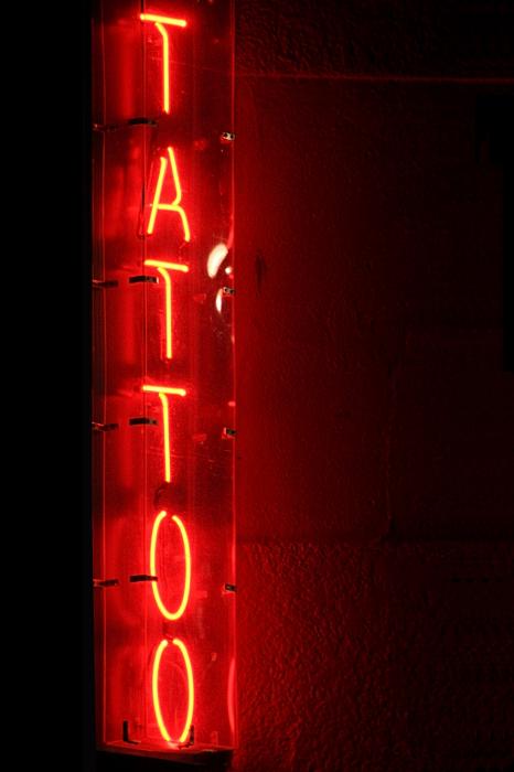 tattoo photographs, sign photographs, neon photographs, moody photographs, 