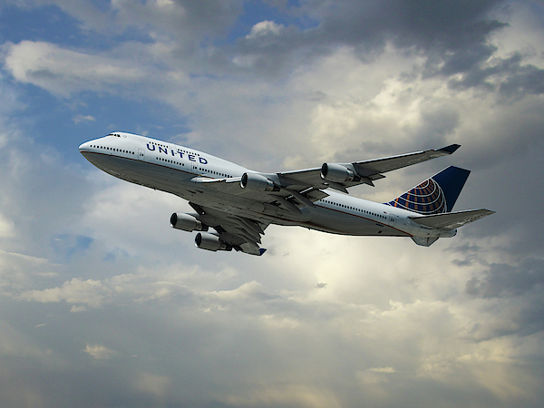 Transportation Photograph - Classic United Airlines Boeing 747 by Erik Simonsen