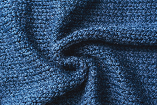 Blue knitted Jersey as textile background. Trendy classic blue color textule as color of year 2020 concept. Copy space for text and design. Photograph by Kseniya Ovchinnikova Blue knitted Jersey as textile background. Trendy classic blue color textule as color of year 2020 concept. Copy space for text and design. Photograph by Kseniya Ovchinnikova