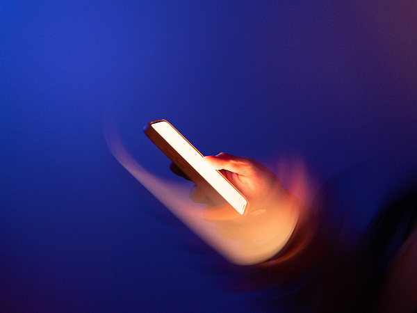 Close Up Of Holding Smartphone Qi Yang