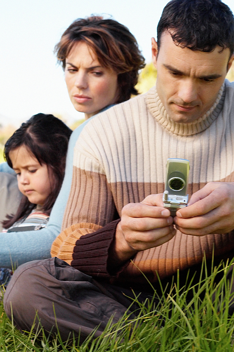 Man using mobile phone Photograph by Image Source Man using mobile phone Photograph by Image Source