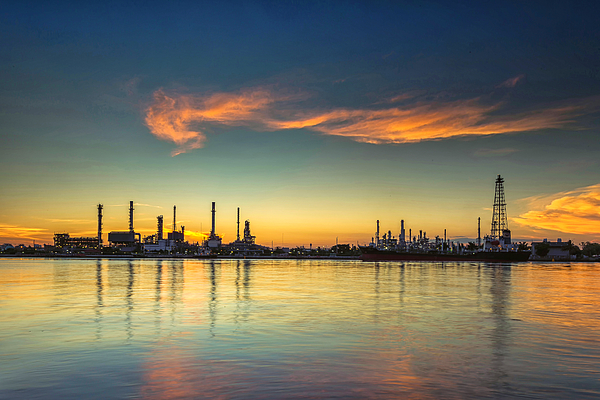 Oil refinery and petrochemical plant at sunrise.- Oil and gas industry Photograph by Phutthiseth Thongtae