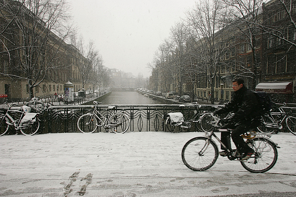 Snow Falls In Amsterdam Photograph by Christopher Furlong