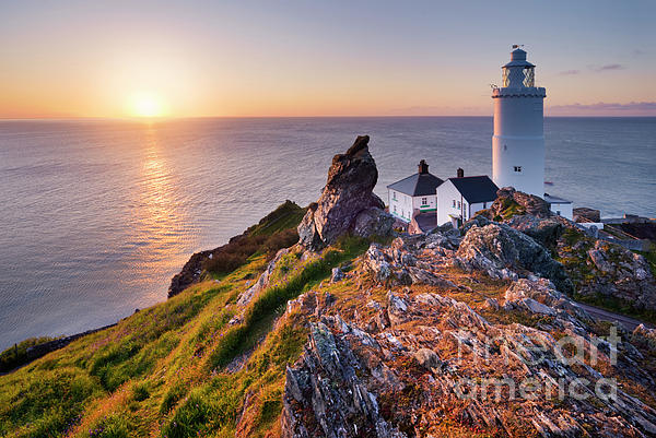 Lighthouse Photograph - Start Point Lighthouse at sunrise, South Devon by Justin Foulkes