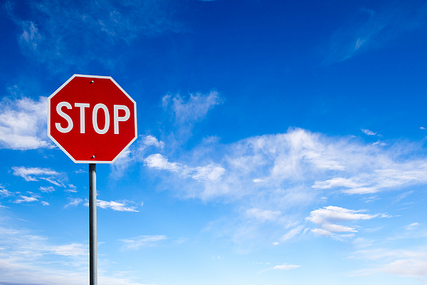Stop Sign With Blue Sky Background and Copy Space Photograph by Ronniechua