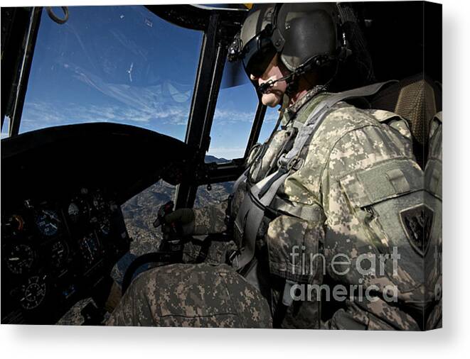 Exercise Angel Thunder Canvas Print featuring the photograph Co-pilot Flying A Ch-47 Chinook #1 by Terry Moore