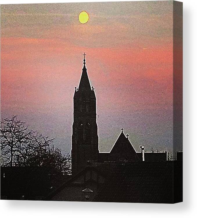 Industrial Canvas Print featuring the photograph The Evening Moon Glows Above A Church by Michael Comerford