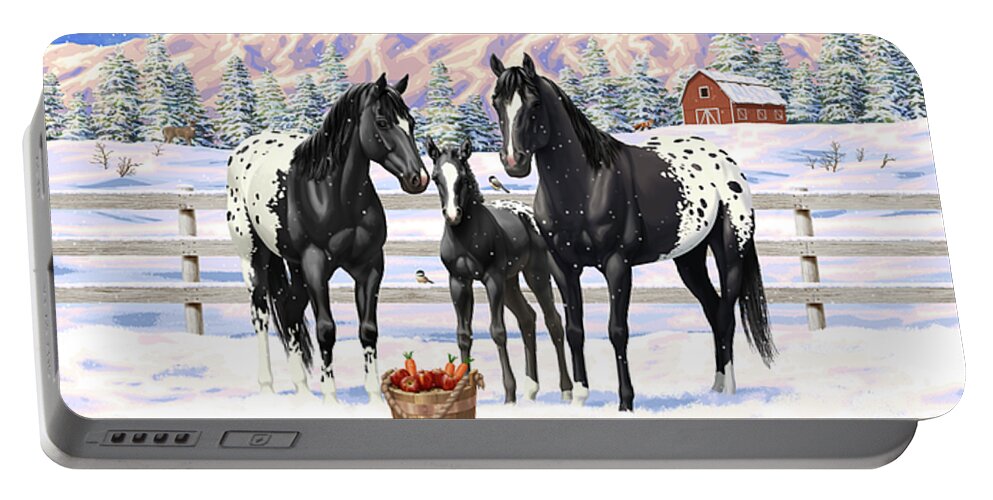 Horses Portable Battery Charger featuring the painting Black Appaloosa Horses In Snow by Crista Forest