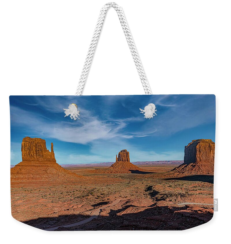 © 2017 Lou Novick All Rights Reversed Weekender Tote Bag featuring the photograph The Mittens and Merrick Butte by Lou Novick