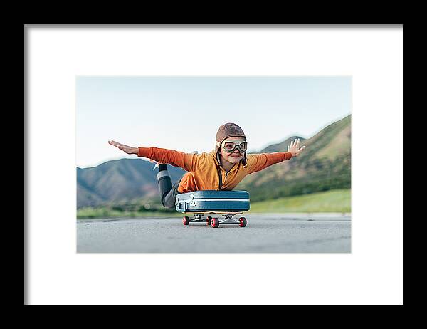 Taking Off Framed Print featuring the photograph Young Boy Ready to Travel with Suitcase by RichVintage