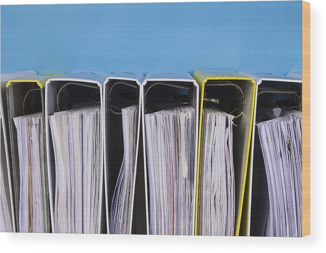 Corporate Business Wood Print featuring the photograph Folder shelfs in a row by Westend61