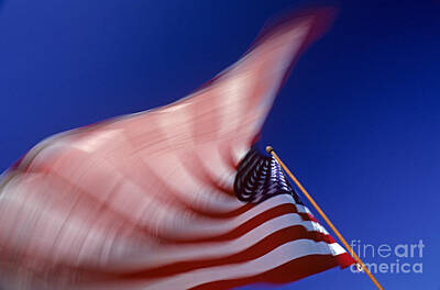 Queen - American Flag blurred waving in the wind  by Jim Corwin