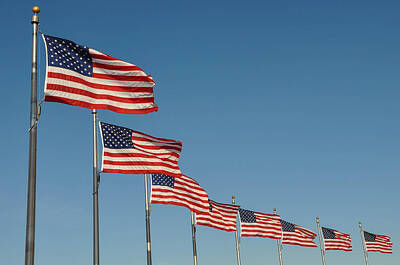 Landmarks Photos - American Flag Waving in the Wind by Brandon Bourdages