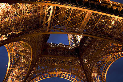 Landmarks Rights Managed Images - Base Of Eiffel Tower After Dark Royalty-Free Image by Carl Purcell