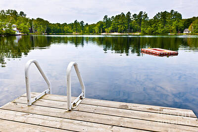 Spaces Images - Dock on calm lake in cottage country by Elena Elisseeva