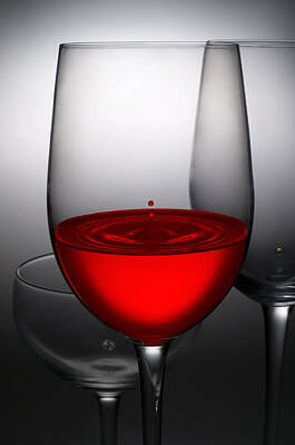 Wine Royalty-Free and Rights-Managed Images - Drops Of Wine In Wine Glasses by Setsiri Silapasuwanchai