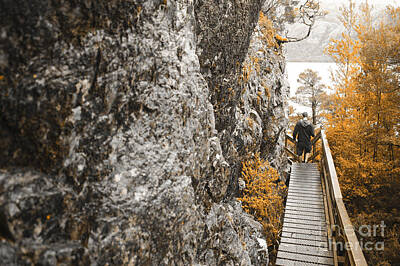University Icons - Man hiking in Cradle Mountain Tasmania Australia by Jorgo Photography