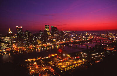 City Scenes Royalty-Free and Rights-Managed Images - Red dawn sky Pittsburgh city light skyline by Blair Seitz