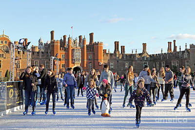 Sewing Machine - Ice skating at Hampton Court Palace ice rink England UK by Julia Gavin