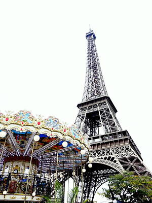 Animals And Earth Rights Managed Images - Altered Image Of A Carousel And Eiffel Tower In Paris France Royalty-Free Image by Rick Rosenshein