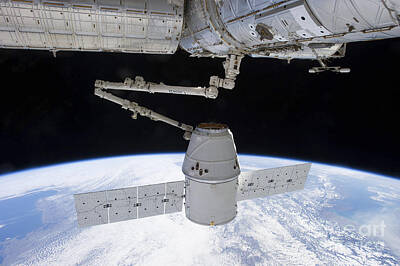 Fantasy Royalty Free Images - Spacex Dragon During Its Docking Royalty-Free Image by Stocktrek Images