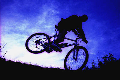 Athletes Royalty-Free and Rights-Managed Images - A Bicycle Stunt by Corey Hochachka