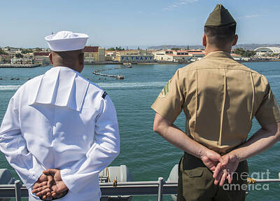 Beach Royalty Free Images - A Sailor And Marine Man The Rails Royalty-Free Image by Stocktrek Images