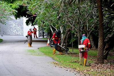 Old Masters Royalty Free Images - Camouflaged leaf blowers working in Singapore park Royalty-Free Image by Imran Ahmed