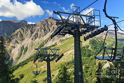 Travel Luggage Royalty Free Images - chair lift in Italian Alps Royalty-Free Image by Antonio Scarpi