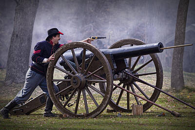 Garden Tools - Civil War Reenactor firing a Revolver by Randall Nyhof