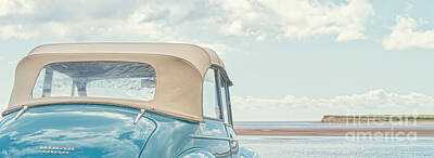 Transportation Royalty Free Images - Classic Vintage Morris Minor 1000 Convertible at the beach Royalty-Free Image by Edward Fielding