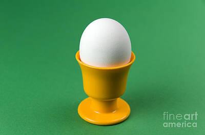 Target Threshold Photography - Egg in cup at green background by Kennerth and Birgitta Kullman