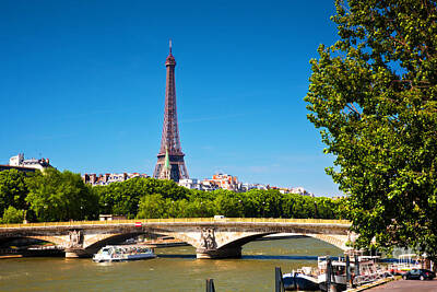 Paris Skyline Royalty Free Images - Eiffel Tower and bridge on Seine river in Paris France Royalty-Free Image by Michal Bednarek