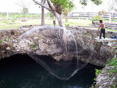 Juj Winn - Fishing in a sinkhole by Daniel Garcia-Bedoya
