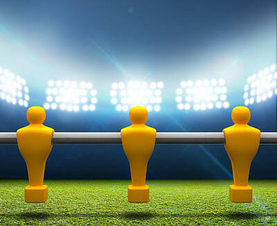 Football Rights Managed Images - Floodlit Stadium With Foosball Players Royalty-Free Image by Allan Swart