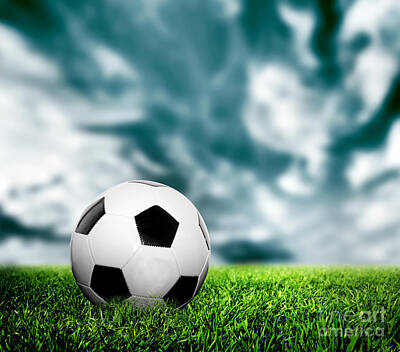 Fight Club Royalty-Free and Rights-Managed Images - Football soccer A leather ball on grass by Michal Bednarek