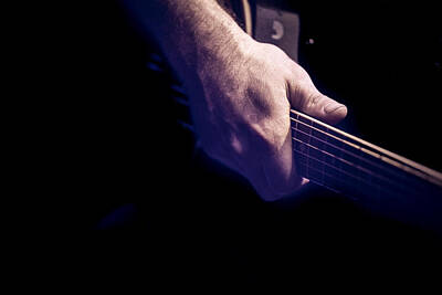 Musician Photo Royalty Free Images - Hand holding a guitar Royalty-Free Image by Joel  Bourgoin 