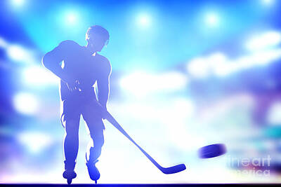 Athletes Royalty Free Images - Hockey player shooting on goal Royalty-Free Image by Michal Bednarek