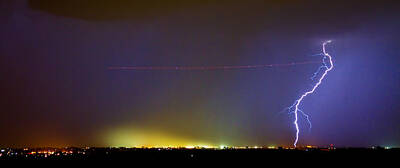 James Bo Insogna Rights Managed Images - Jet Over Colorful City Lights and Lightning Strike Panorama Royalty-Free Image by James BO Insogna