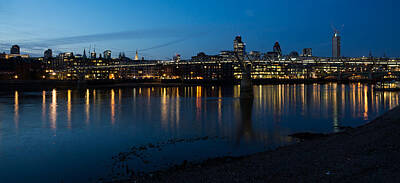 London Skyline Rights Managed Images - London Skyline Reflecting in the Thames River at Night Royalty-Free Image by Georgia Mizuleva