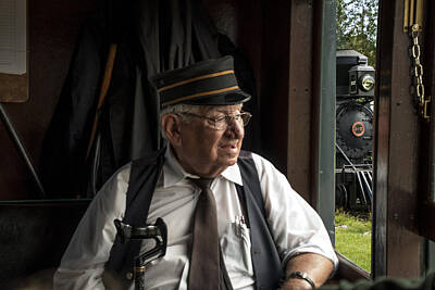 Randall Nyhof Royalty-Free and Rights-Managed Images - Old Train Conductor by Randall Nyhof