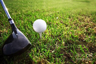 Sports Photos - Playing golf. Club and ball on tee by Michal Bednarek