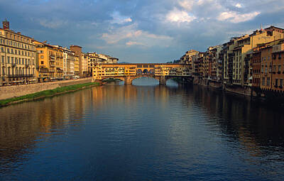 Sultry Plants Rights Managed Images - Ponte Vecchio at Sunset Royalty-Free Image by Kathy Yates