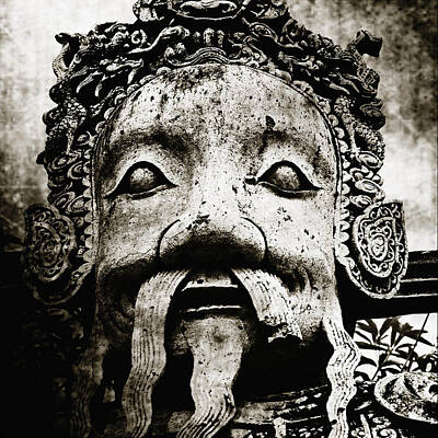 Glass Of Water Rights Managed Images - Stone Face Statue At Wat Po Royalty-Free Image by Skip Nall
