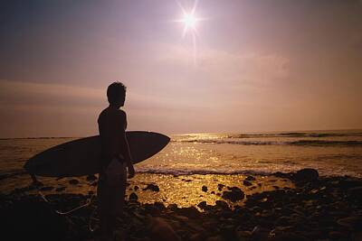 Landscapes Photos - Surfer At The End Of The Day On The by Darren Greenwood