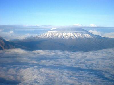 Pop Art Rights Managed Images - The peaks of Kilimanjaro Royalty-Free Image by Tuntufye Abel