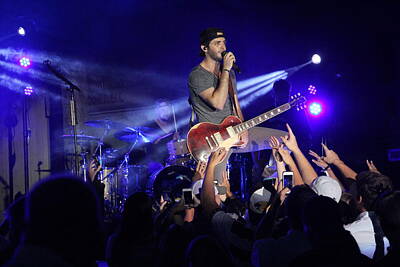 Musicians Photo Rights Managed Images - Thomas Rhett and Fans 2014 Concert Royalty-Free Image by Valerie Collins