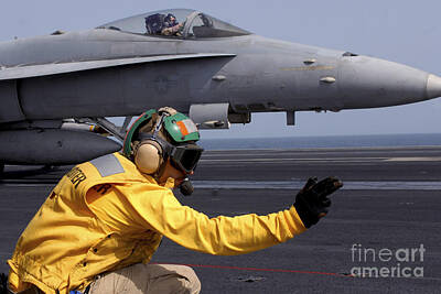 Politicians Photo Royalty Free Images - A Shooter Launches An Fa-18e Super Royalty-Free Image by Stocktrek Images