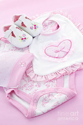 Floral Royalty Free Images - Pink baby clothes for infant girl 3 Royalty-Free Image by Elena Elisseeva